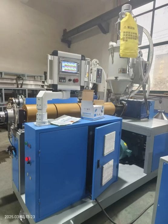 SUHUI Drinking Straw Making Machine SUHUI drinking straw making machine with blue extruder, PLC touchscreen control panel, and automatic material hopper